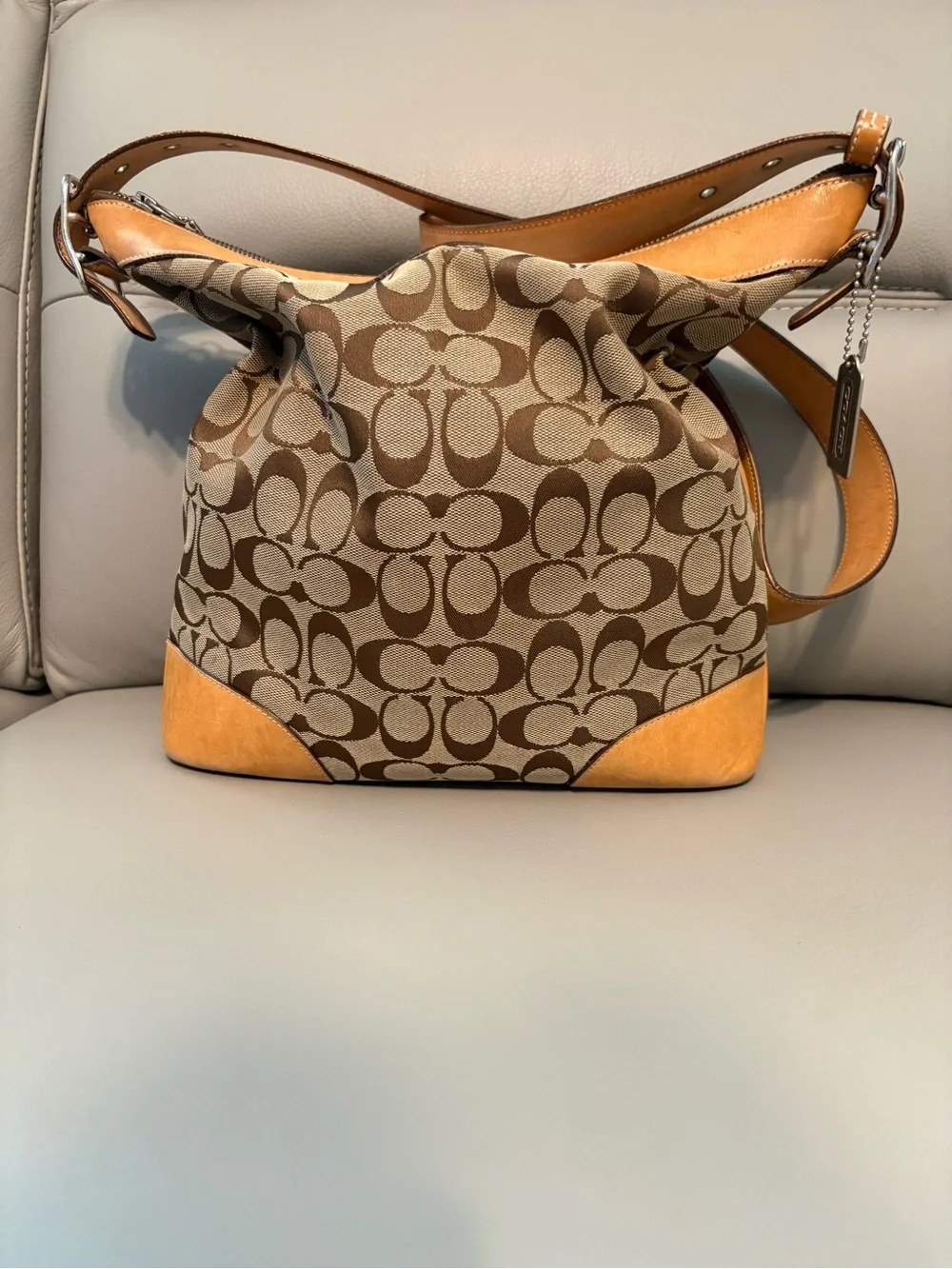 Coach Signature Canvas Shoulder Bag/Crossbody Hobo bag in Brown and Tan